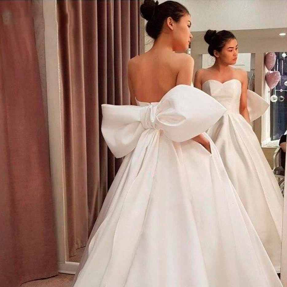 Top 10 Wedding Dresses with Bows on the Back | The Bridal Finery